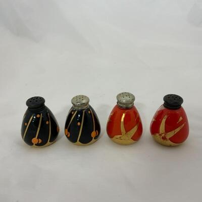 .125. Antique | Sterling Tops | Orange & Black Gilded Salt & Peppers