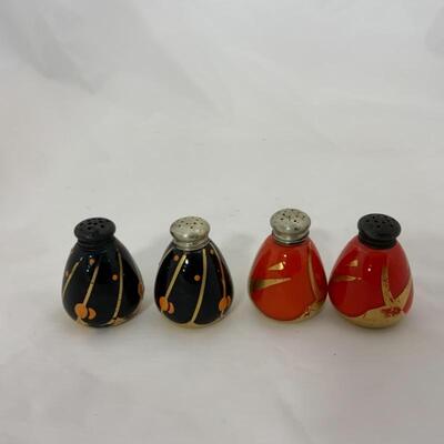 .125. Antique | Sterling Tops | Orange & Black Gilded Salt & Peppers