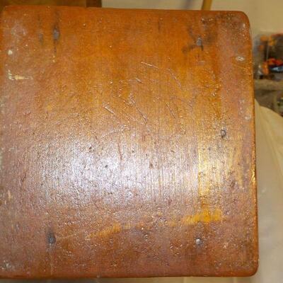 Vintage coffee grinder and wood boat model.