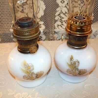 Pair Aladdin oil lamps, painted milk glass bases, 9" with 12" chimneys (#45)