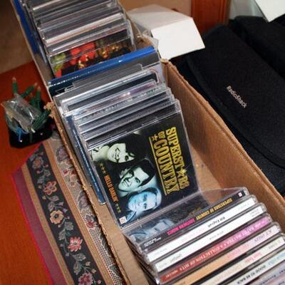 About 50 Country music CD's