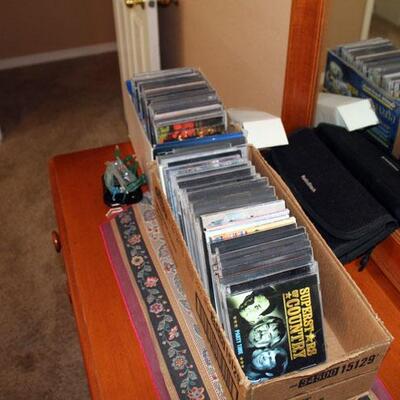 About 50 Country music CD's