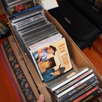About 50 Country music CD's