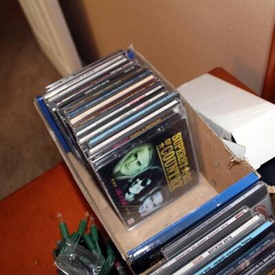 About 50 Country music CD's