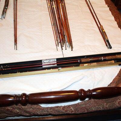 Two fiberglass fishing poles in metal case (#138)