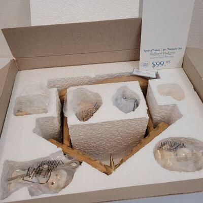 Lot 10: Precious Moments Porcelain Nativity Set NEW 