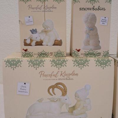 Lot 23: Assorted Dept. 56 Snowbabies Christmas Figures