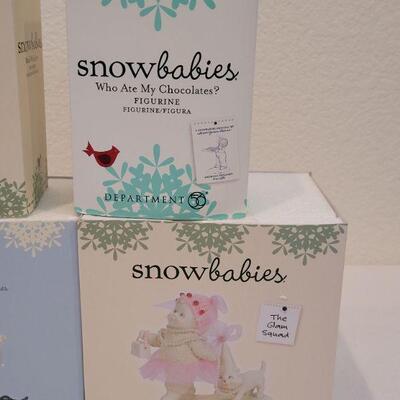 Lot 24: Assorted Dept. 56 Snowbabies Christmas Figures 