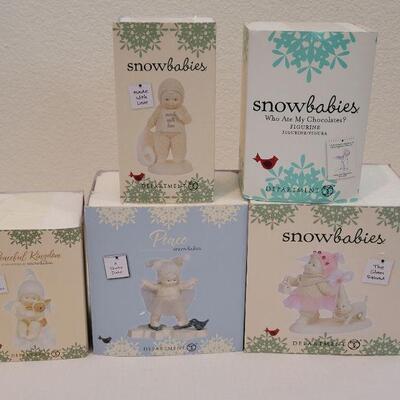 Lot 24: Assorted Dept. 56 Snowbabies Christmas Figures 