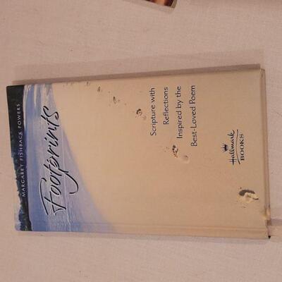 Lot 8: (2) Religious Hangings and Footprints Book