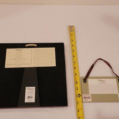 Lot 8: (2) Religious Hangings and Footprints Book