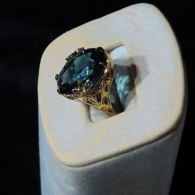 Aqua colored gold tone ring