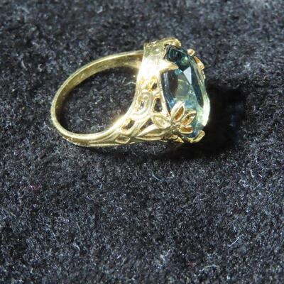 Aqua colored gold tone ring