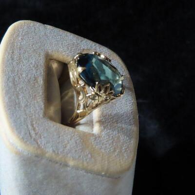 Aqua colored gold tone ring