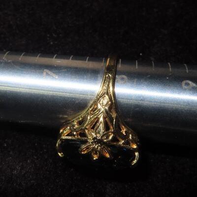Aqua colored gold tone ring