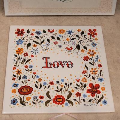 Lot 9: New Celebration Quilts Porcelain Trivet, Vintage Love Trivet & (3) Ceramic Quilt Hanging Deco