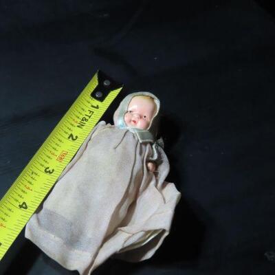 Antique mini doll