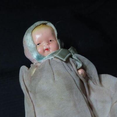 Antique mini doll