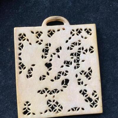 217 Hand carved bone pendant 