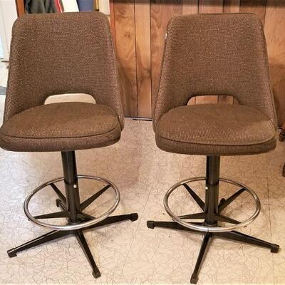 Lot #97  Pair of Mid-Century Swivel Bar Stools