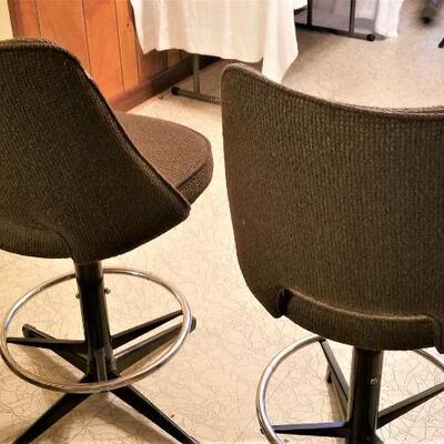Lot #97  Pair of Mid-Century Swivel Bar Stools