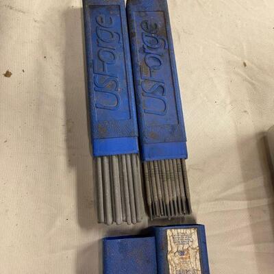 Two boxes of welding sticks 