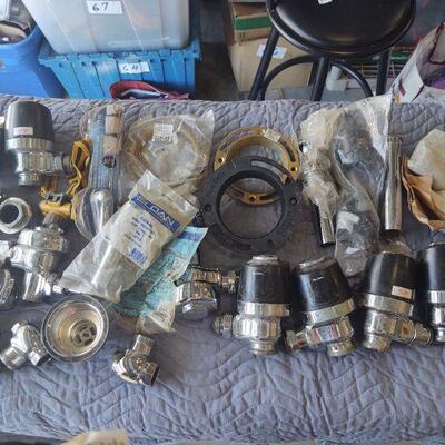 LOT 81 -Plumbing parts as shown, in bucket
