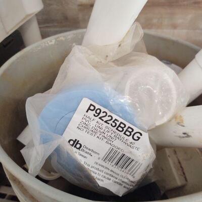 LOT 86 Two buckets of parts 