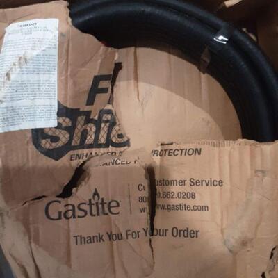 lot 92 - Hot water heater tray,  100' 3/4" x 100' PEX tubing, Gastite tubing