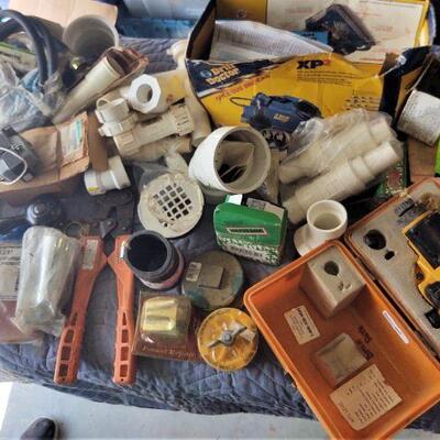 lot 112 - Auto-level in case, Drill Doctor, MFD 10 capacitor tester, pvc parts, hose, tool, etc.