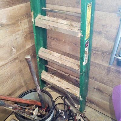 lot 114 -Ridgid 700 pipe threading machine, ladder, submersible 1/3hp pump, pipe wrench, chain wrench, puller in bucket, etc