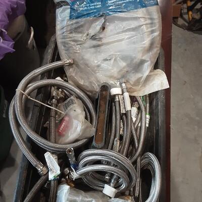 lot 123 - Bin of 23 various hoses, etc. as shown