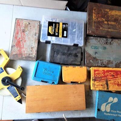 lot 129 -assorted parts, kits, tape measure, organizer/contents, removable seats, Craftsman, Creed, O-rings, etc.