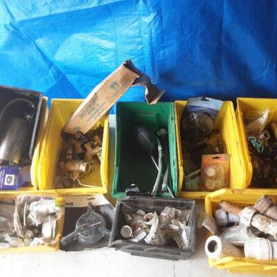 lot 133 - Several bins of assorted plumbing parts on this shelf only