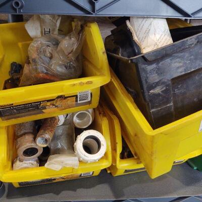 lot 133 - Several bins of assorted plumbing parts on this shelf only