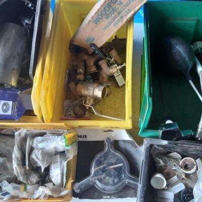 lot 133 - Several bins of assorted plumbing parts on this shelf only
