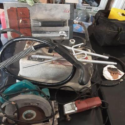 lot 139 -Gray bin with assorted power tools, etc. as shown on table top only