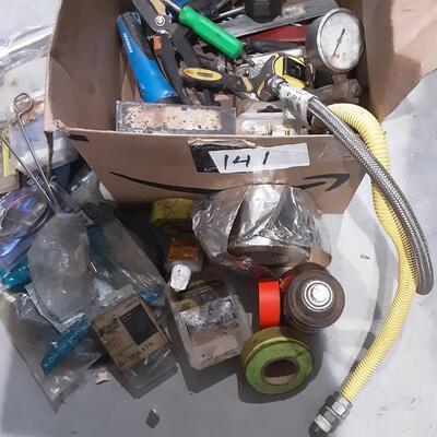 lot 141 - Hose, asstd plumbing, tape, screws, anchor bolts, washers, gas pilot light control, gauge, etc.