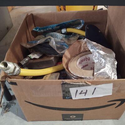 lot 141 - Hose, asstd plumbing, tape, screws, anchor bolts, washers, gas pilot light control, gauge, etc.