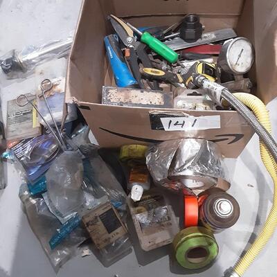 lot 141 - Hose, asstd plumbing, tape, screws, anchor bolts, washers, gas pilot light control, gauge, etc.