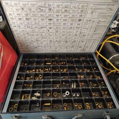 lot 150 -Assorted plumbing parts and case of parts