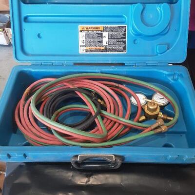 lot 152 - Miller cutting torch hoses and gauges in case