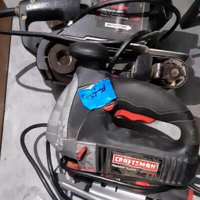 lot 192 - Craftsman electric  belt  sander and variable speed sabre saw