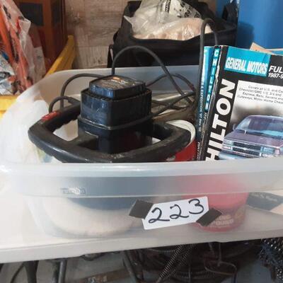 \lot 223 - Bin of automotive, car waxer, jack, waxes, Chilton and Haynes repair manuals, etc.
