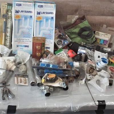 Lot 227 of assorted plumbing incl. Lav guard, fluid siphon pump, pvc parts, tools, zip ties, plumbers tape, 