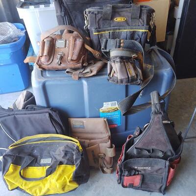 lot 236 -Assorted leather and fabric tool bags and belts, as shown in crate