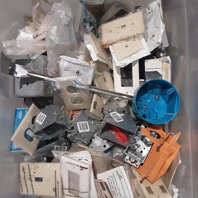 lot 250 - Large bin of assorted electrical parts