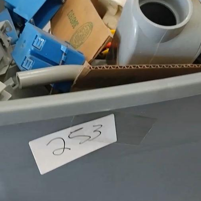 lot 253 - Gray bin of assorted plumbing parts AS SHOWN