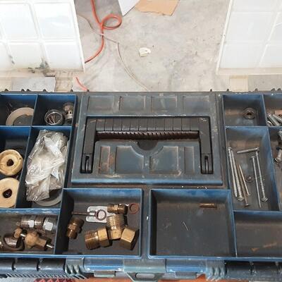lot 258 - Tool box of assorted parts and tools as shown, including Transformer, Ratchet driver, safety glasses, dual capacitor, tape...