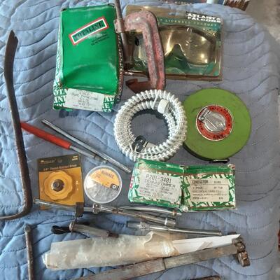 lot 258 - Tool box of assorted parts and tools as shown, including Transformer, Ratchet driver, safety glasses, dual capacitor, tape...